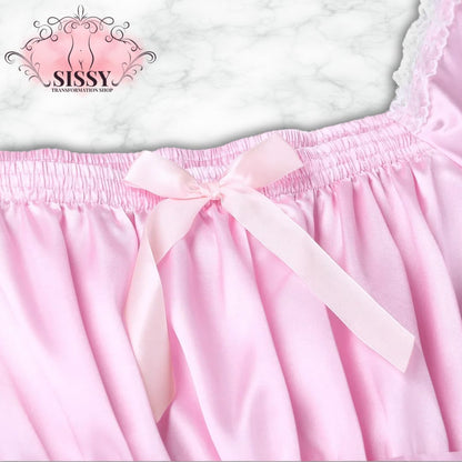 Nuisette dolly en satin et dentelle rose avec nœud délicat à la taille pour une touche féminine