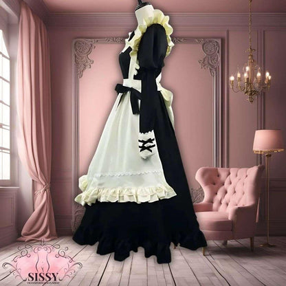 Robe Sissy Maid Lolita noire avec tablier blanc et volants dans un décor élégant