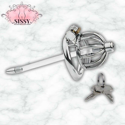 Cage de chasteté Nub en acier avec clés et prolongateur en plastique blanc sur fond marbre