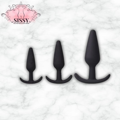 Lot de trois plugs anaux en silicone noir de différentes tailles vendus par Sissy Transformation Shop