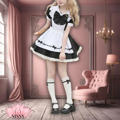 Femme portant une robe sissy maid noire et blanche avec nœuds dans un intérieur élégant