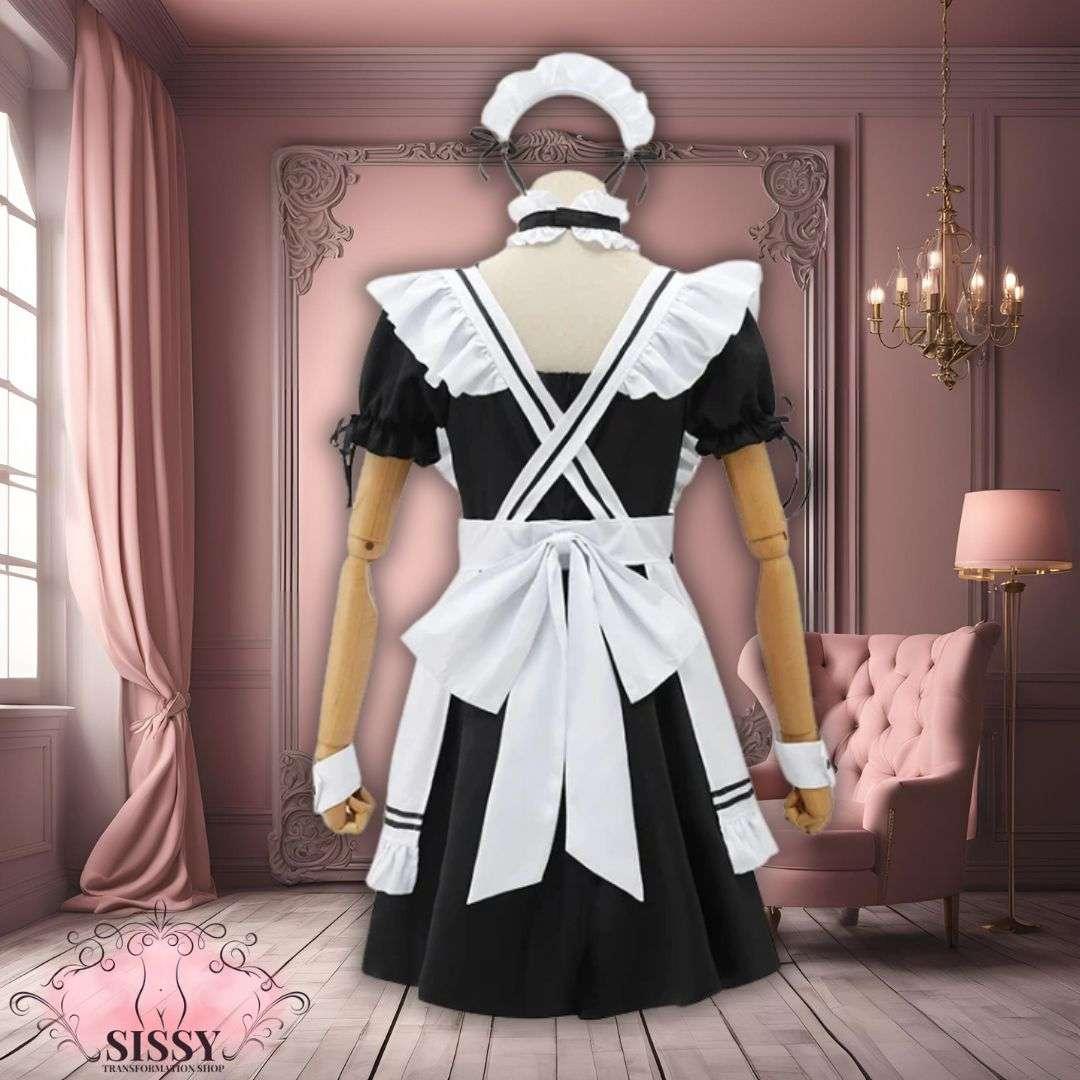 Robe Sissy Maid noire et blanche avec tablier et accessoires dans un décor élégant