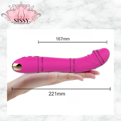 Vibromasseur en silicone rose ergonomique avec dimensions détaillées tenant dans une main